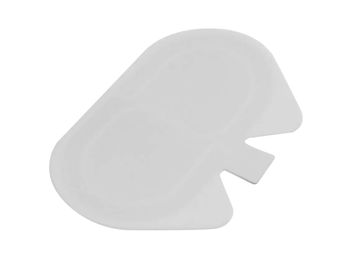 Selbstklebende, graue Neutralelektrode in ergonomischer Form, vor weißem Hintergrund.