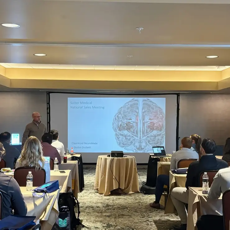 Attendees listen to an expert presentation in a conference setting. The event highlights professional learning, knowledge sharing, and industry networking.