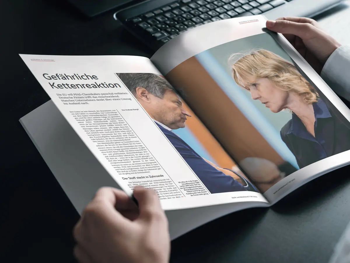 Person viewing a digital brochure or presentation on a tablet.