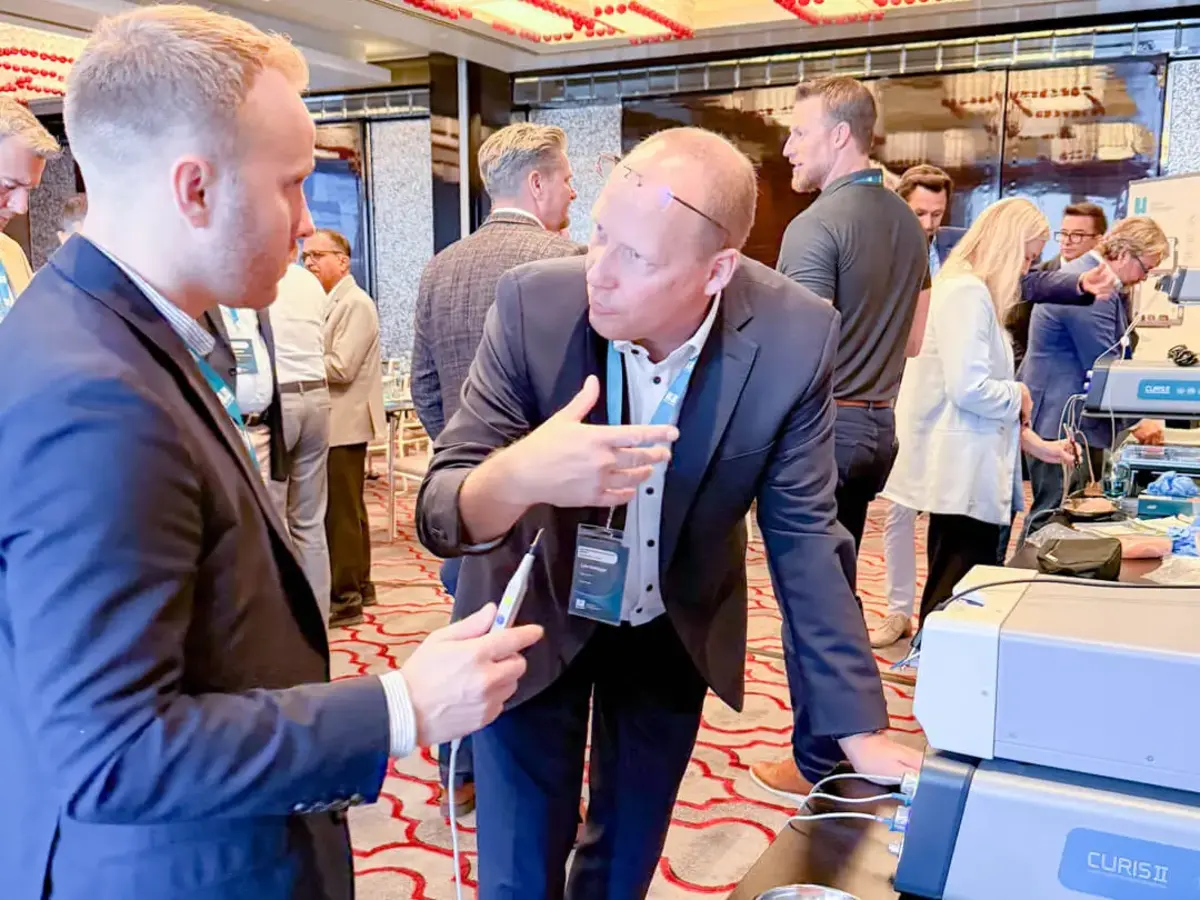 Participants discussing a product application at a demonstration station during the Sutter Distributor Conference 2026 in Istanbul.