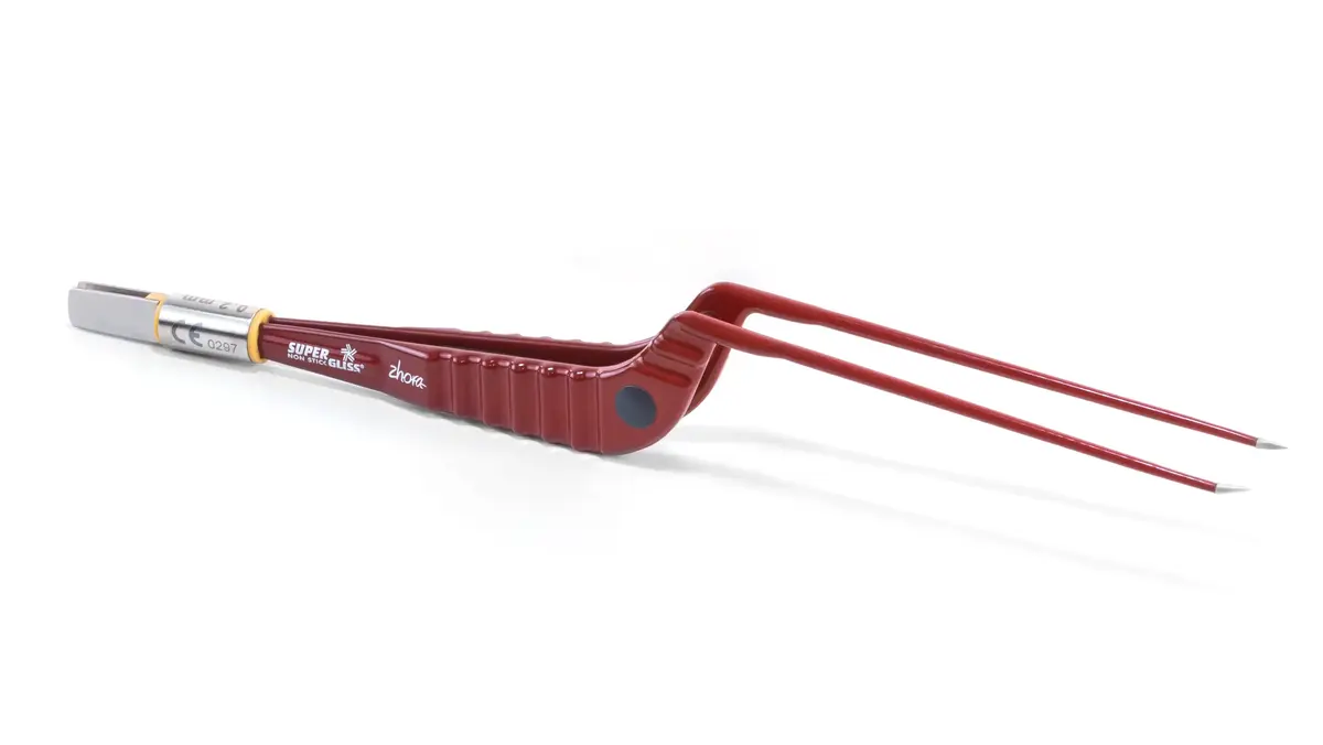 Red SuperGliss non-stick zhora bipolar forceps with a curved shape on a white background